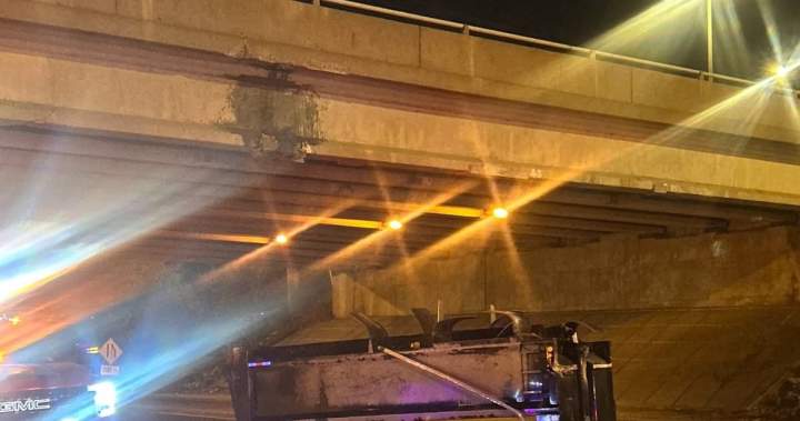 Ontario driver charged after raised dump truck box crashes into Highway 400 overpass